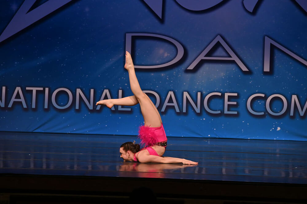 Solo dancer performing at CRU Dance Nationals